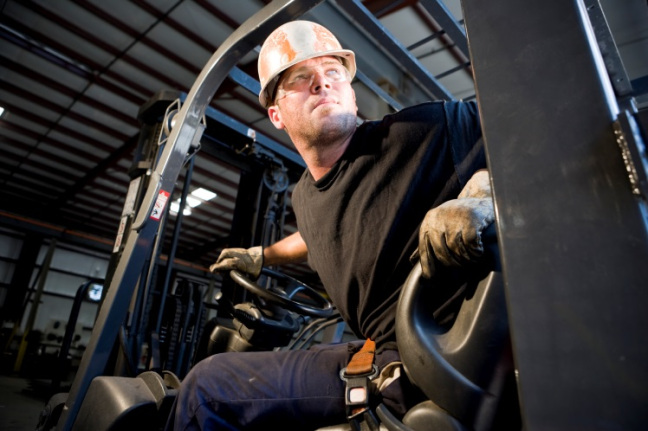 new employee on a forklift