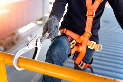 Construction worker safety harness safety line