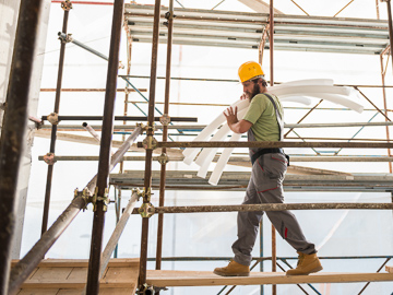 Construction worker on scaffolding