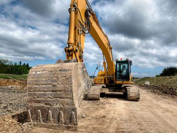 Backhoe doing roadwork